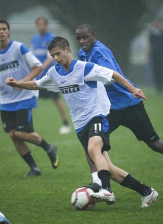 Soccer player dribbling the ball during a practice.