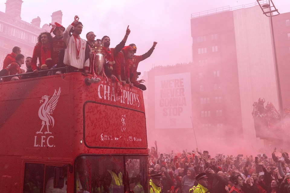 Liverpool Premier League champions on a parade bus.
