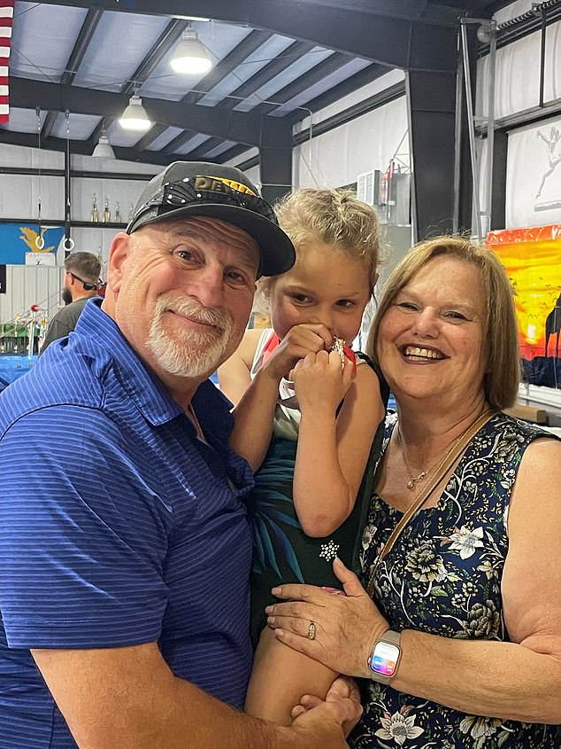Engel is pictured above with wife Shelley and one of his grandchildren. He said it was heartbreaking to know he wouldn't be able to see the children grow up or his wife smile again