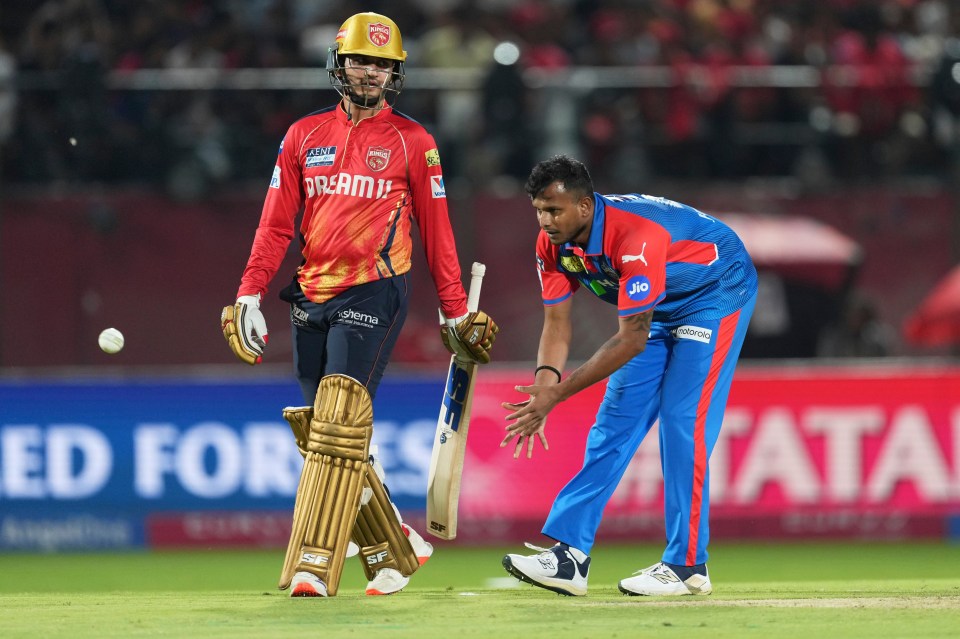 Cricket players T Natarajan and Priyansh Arya during an IPL match.