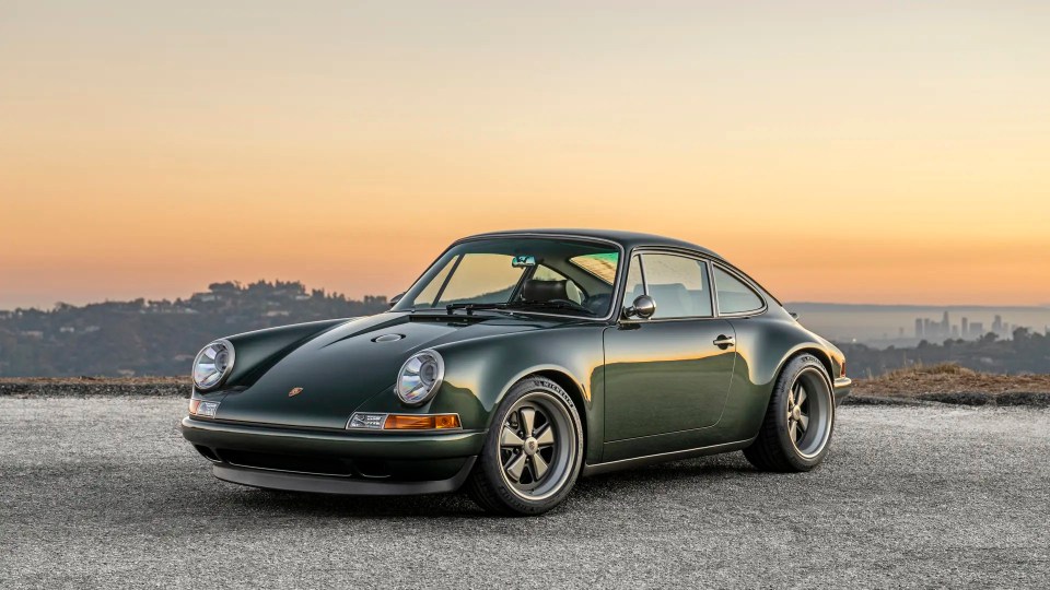 Singer-reimagined Porsche 911 at sunset.