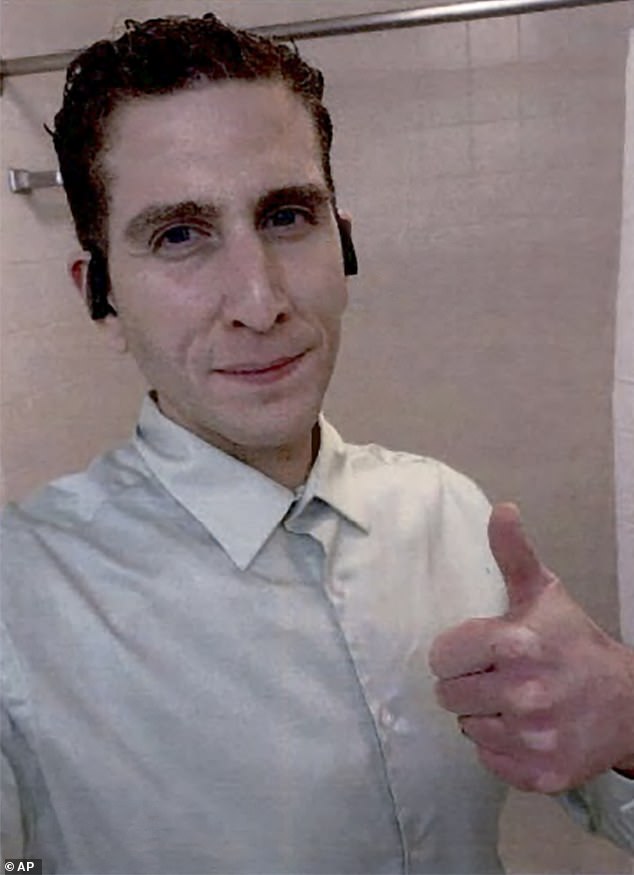After allegedly killing the college students, Kohberger returned to his home in Pullman, Washington - where he took this selfie showing him giving a thumbs up from the bathroom