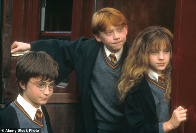 Three currently unknown British children are set to become overnight multi-millionaires when they are announces as the new stars of the Harry Potter TV series; pictured Daniel Radcliffe, Emma Watson and Rupert Grint 2001
