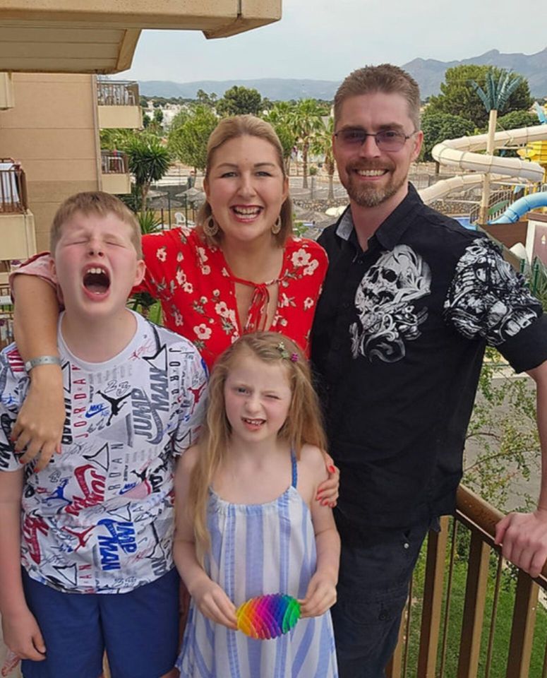 Family portrait on a balcony.