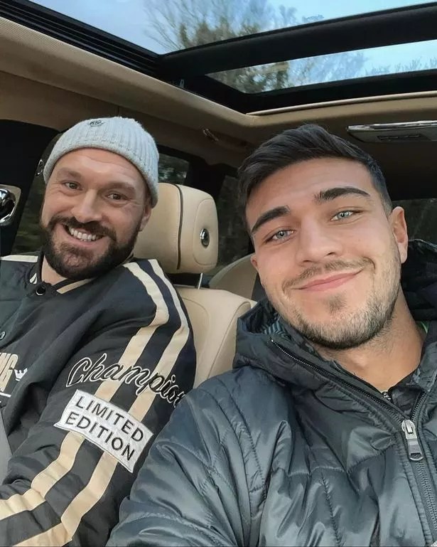 Tommy and Tyson Fury in a car.