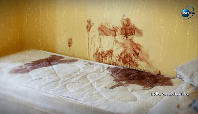 Blood spatter on a mattress and wall.