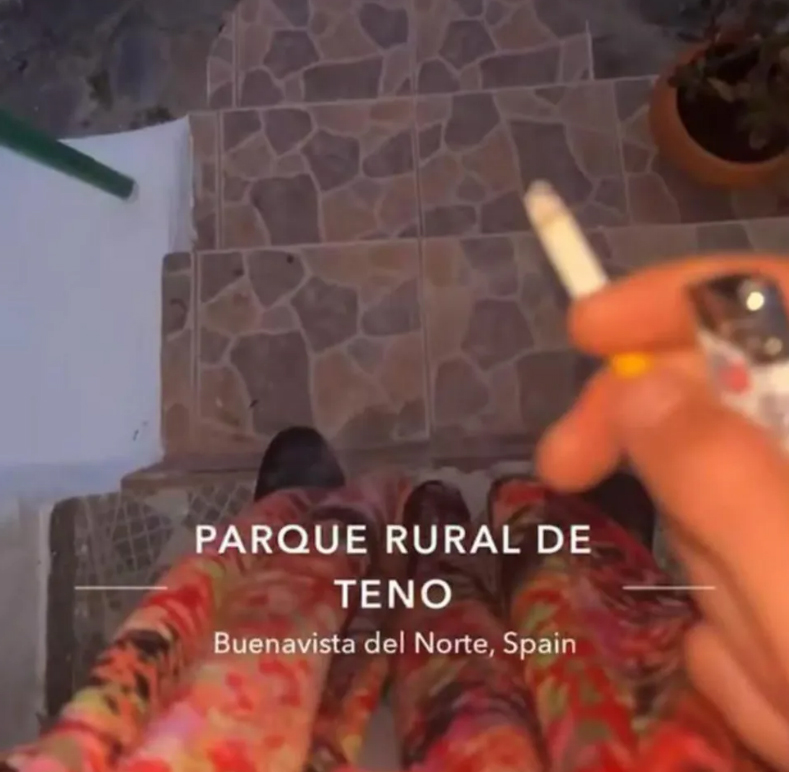 Snapchat image showing legs in patterned pants, a cigarette, and a lighter, with text overlay indicating Parque Rural de Teno, Buenavista del Norte, Spain.