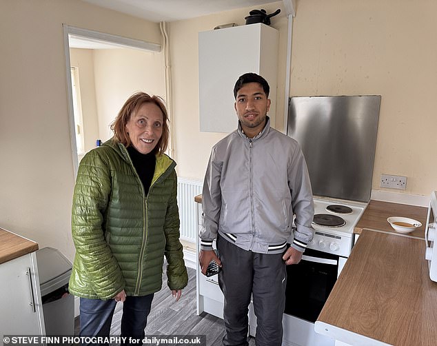 Abdul, a 27-year-old from Afghanistan, with Sue Reid. Abdul is appealing his case after being refused asylum
