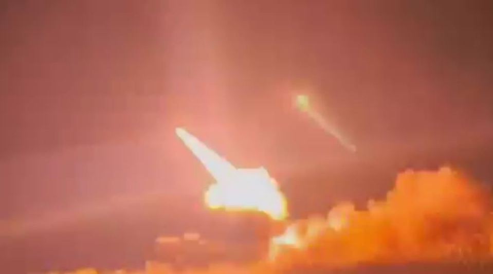 Missile launch at night.