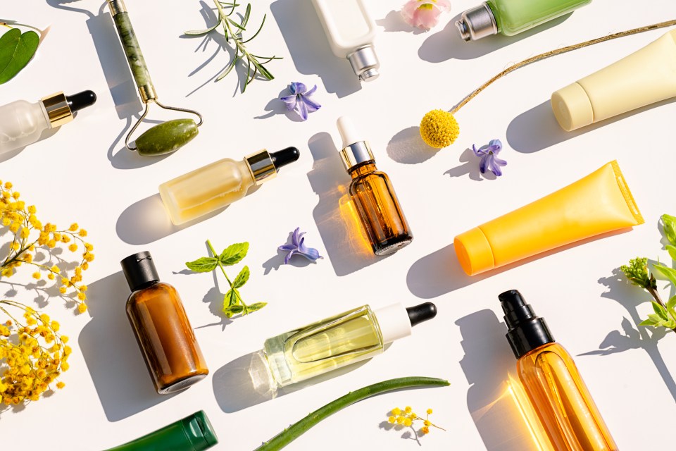 Trendy Collage made of Natural Cosmetics and Beauty Products for Body and Face Care with leaves and flowers. The best gift for Valentine's Day. Holiday's, birthday, International women's day, Mother day, love, party concept. Copy space. Flat lay.