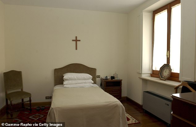 A sparsely decorated room at the Domus Sanctae Marthae where the cardinals are currently staying; the property has 108 suites and 23 single rooms