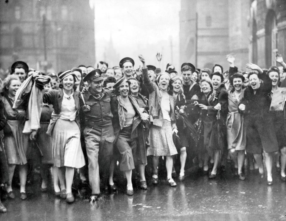 A crowd celebrating VE Day in 1945.