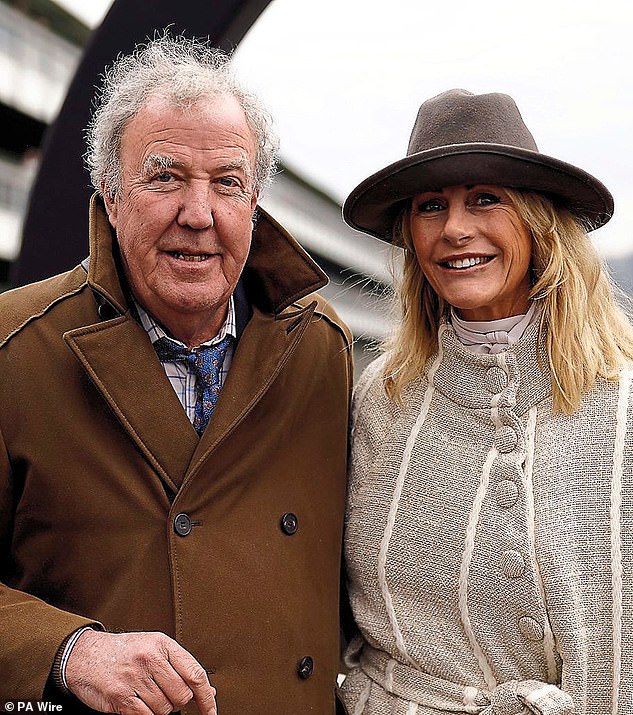 With partner Jeremy Clarkson at this year’s Cheltenham Festival