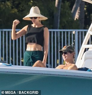 Photographers caught the First Daughter, 43, spending a day out on the water in Miami on Sunday alongside her husband, Jared Kushner, and their sons Joseph, 10, and Theodore, eight