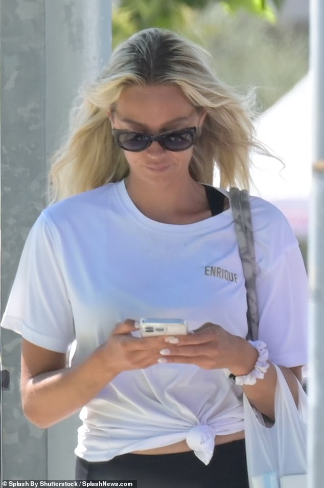 Artursson was busy typing on her phone when she was pictured