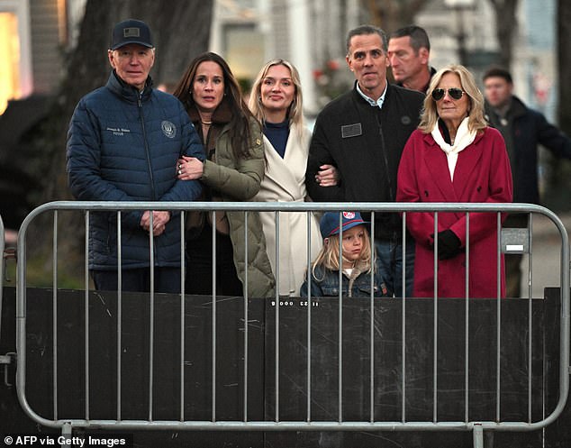 'The President and his family are reviewing treatment options with his physicians,' the statement on his diagnosis notes. Pictured: Joe stands with daughter Ashley, daughter-in-law Melissa Cohen, grandson Beau, son Hunter and wife Jill during the Christmas tree lighting in Nantucket, Massachusetts, on November 29, 2024