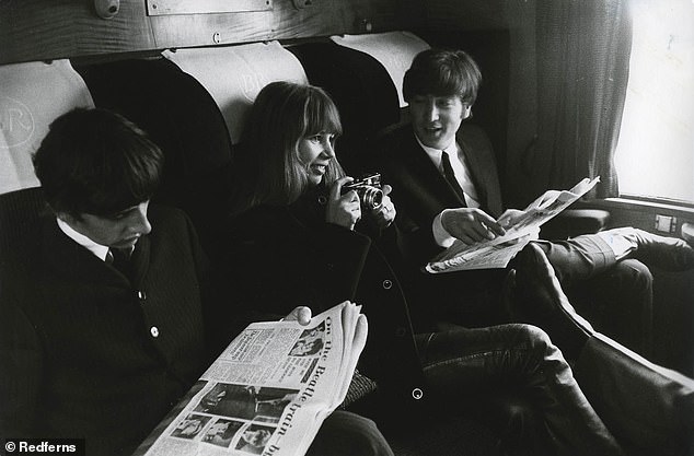 The poem was removed from an A5 notebook he kept in the Hamburg flat of German photographer Astrid Kirchherr, who was a friend of the band. Above: Kirchherr with Lennon (right) and Ringo Starr on a train during the filming of A Hard Day's Night