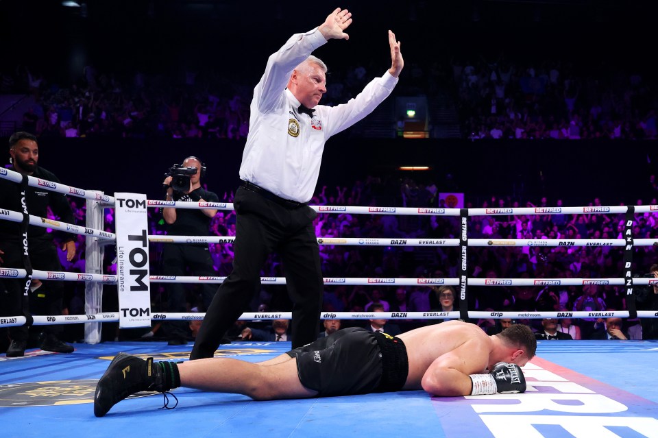 Boxer Johnny Fisher knocked out in a boxing match.