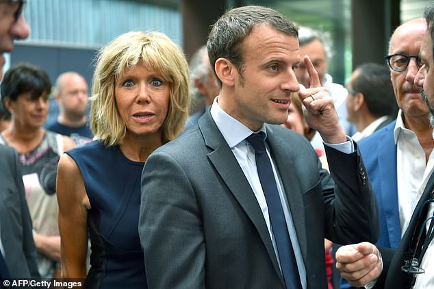 While their massive 24-year age gap would normally elicit a 'you-go-girl!' holler from international cougars, there something else to know about this mis-matched pair¿ she was also once his teacher! (Pictured: Brigitte and Emmanuel Macron in 2017).