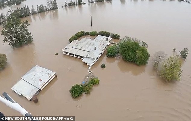 The flooding has devastated the area, with five people confirmed dead after dangerous conditions prevented emergency crews from accessing a home
