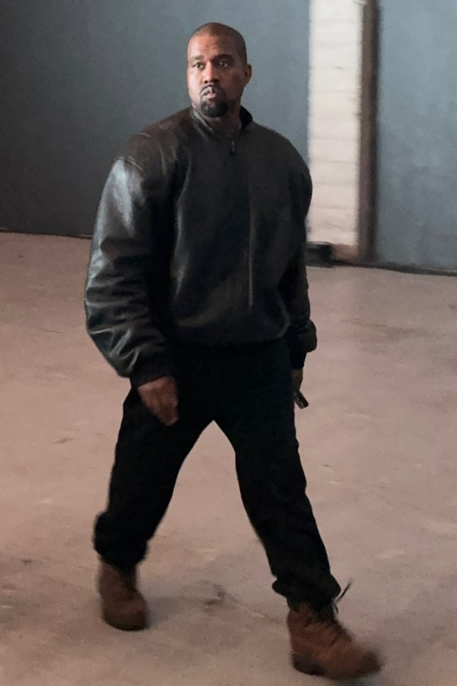 Kanye West walking.