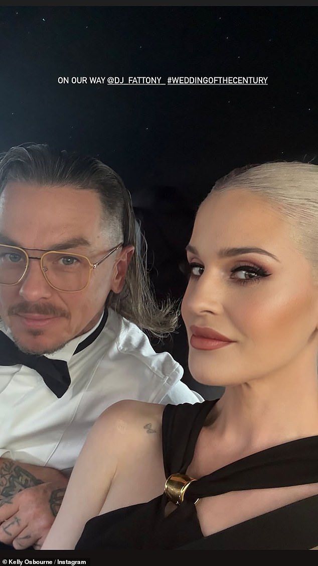 But it wasn't the dress that attracted the most attention - onlookers were left stunned following the Hollywood stars dramatic weight loss journey and what appeared to be - an extremely taught visage (pictured with her boyfriend, Slipknot DJ Sid Wilson)