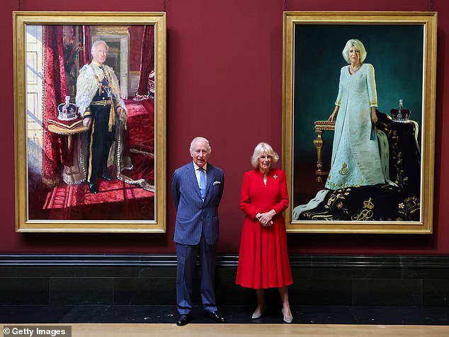 The King and Queen pose with their official Coronation state portraits at the National Gallery
