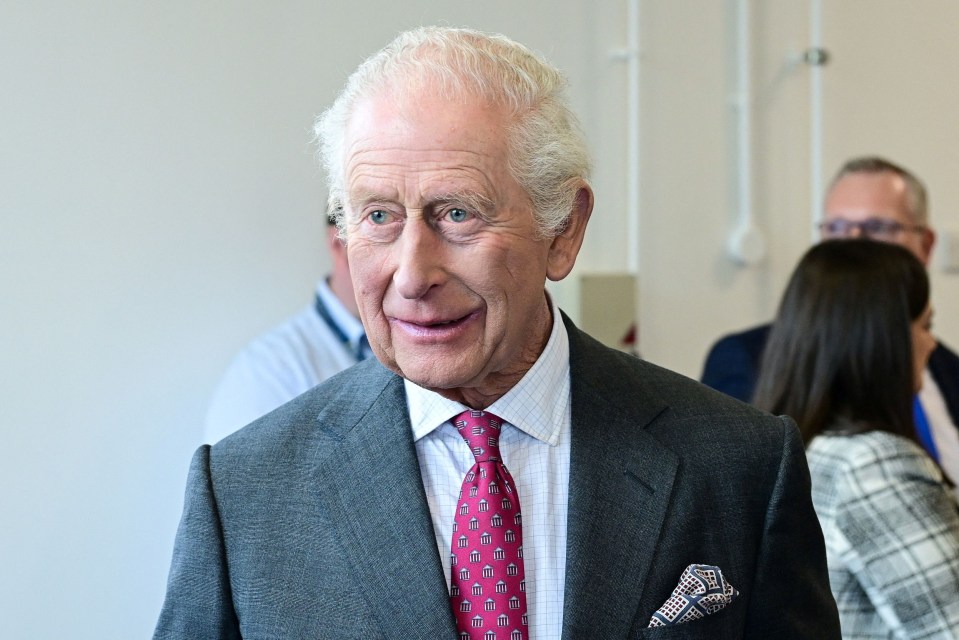 King Charles III at a cancer research center.