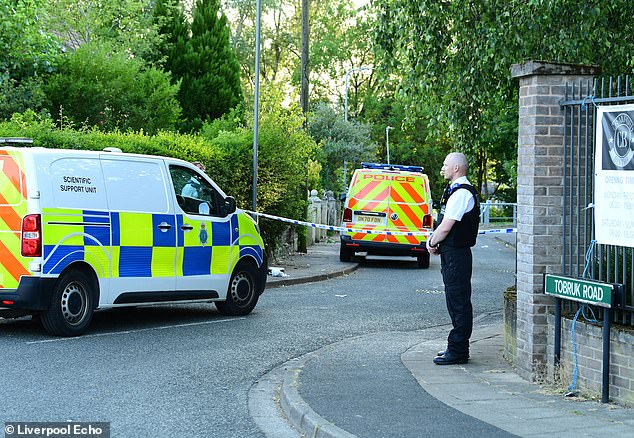 A man suspected of a double stabbing in broad daylight has been shot by armed officers in the Tobruk Road area in Huyton, Merseyside