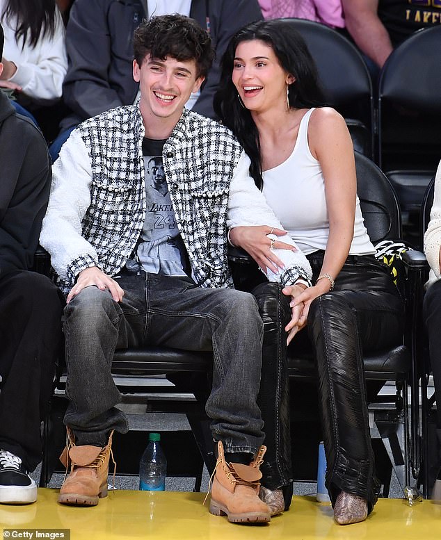 Kylie Jenner couldn't keep her hands off boyfriend Timothee Chalamet during a rare outing together in Los Angeles on Tuesday night