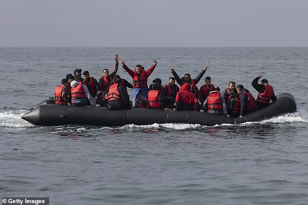 Under Home Secretary Yvette Cooper's plans, the Home Office will be told of all foreign nationals convicted of any offence, while officials will be given wider powers to remove them from the UK (Pictured: an inflatable craft carrying migrants across the Channel in 2022)