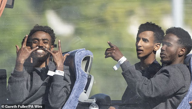 People believed to be migrants have been seen in buses in Dover after Channel crossings yesterday