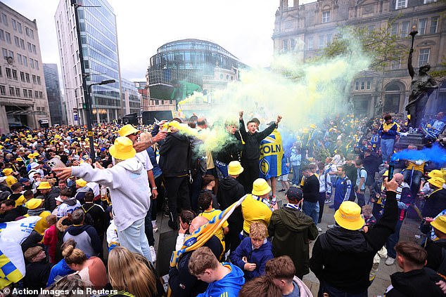 Fans of all ages were out to celebrate their Premier League-bound idols on Monday afternoon