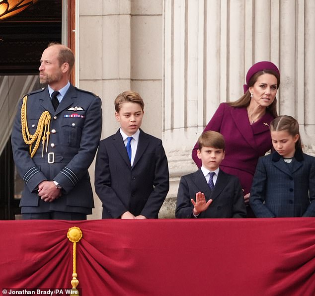 An animated Louise looked to hold his hand out as he and his family viewed the fly past this afternoon