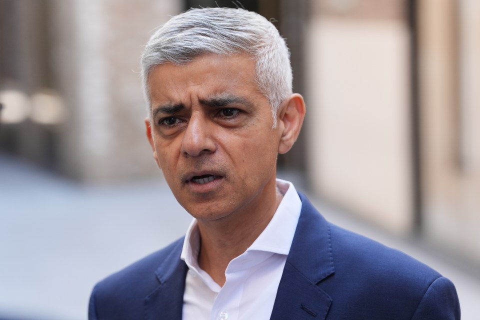 Sadiq Khan speaking at a press event.