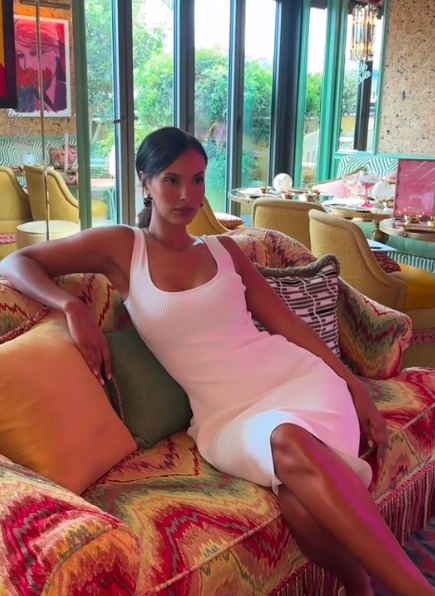 Maya Jama in a white midi dress.