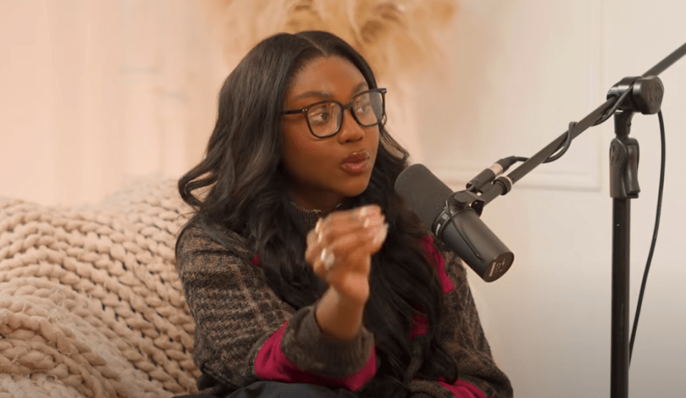 Whitney from Love Island speaking into a microphone.