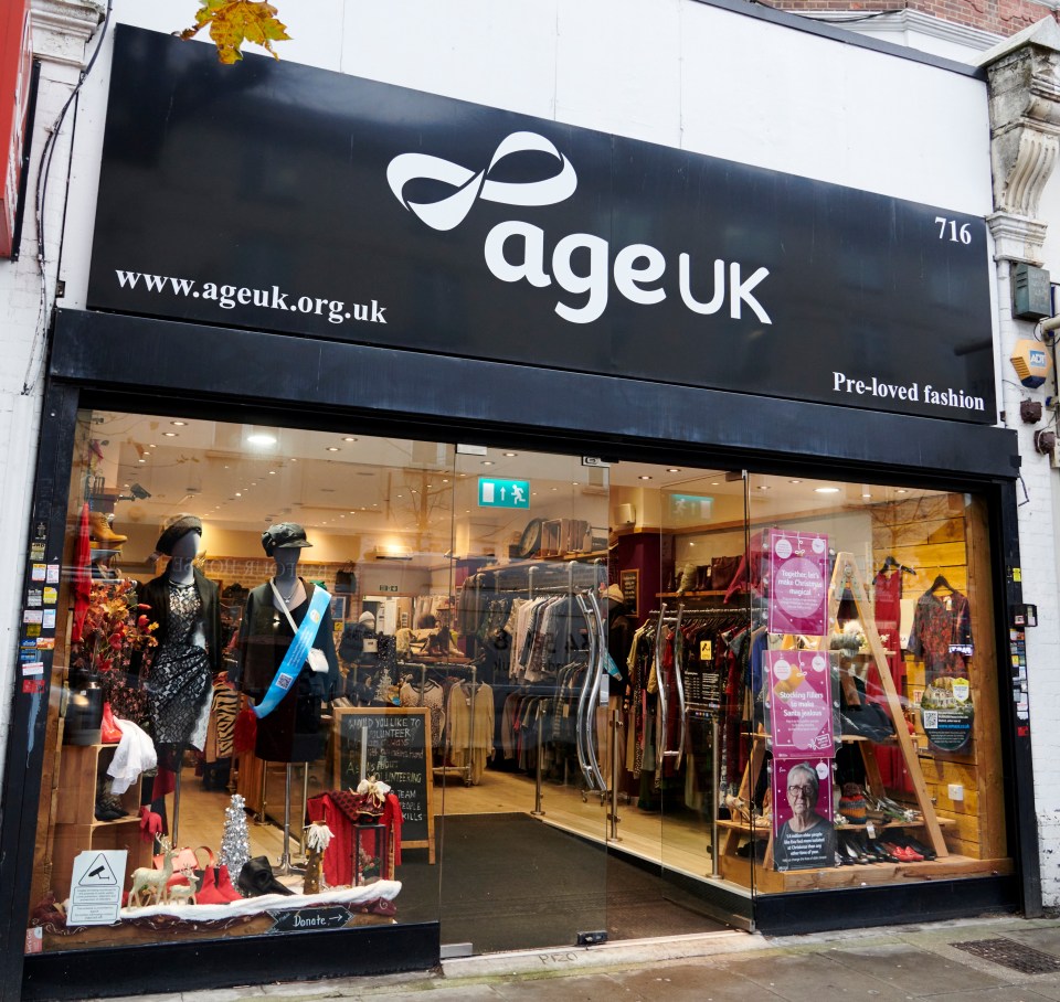 Age UK charity shop storefront.