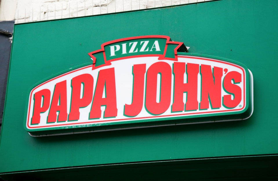 Papa John's logo on a green sign.