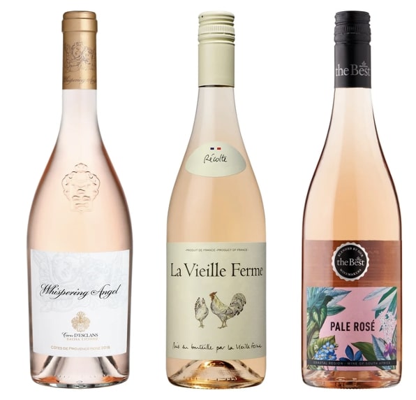 Three bottles of rosé wine: Whispering Angel, La Vieille Ferme, and Pale Rosé.