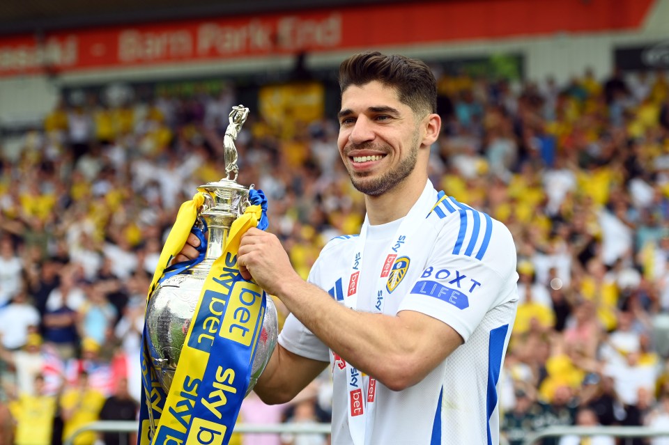 PLYMOUTH, ENGLAND - MAY 03: Manor Solomon of Leeds United, poses for a photo with the Sky Bet Championship trophy after the teams 2-1 victory, which confirmed that the team has won the Sky Bet Championship and promotion to the Premier League following the Sky Bet Championship match between Plymouth Argyle FC and Leeds United FC at Home Park on May 03, 2025 in Plymouth, England. (Photo by Harry Trump/Getty Images)