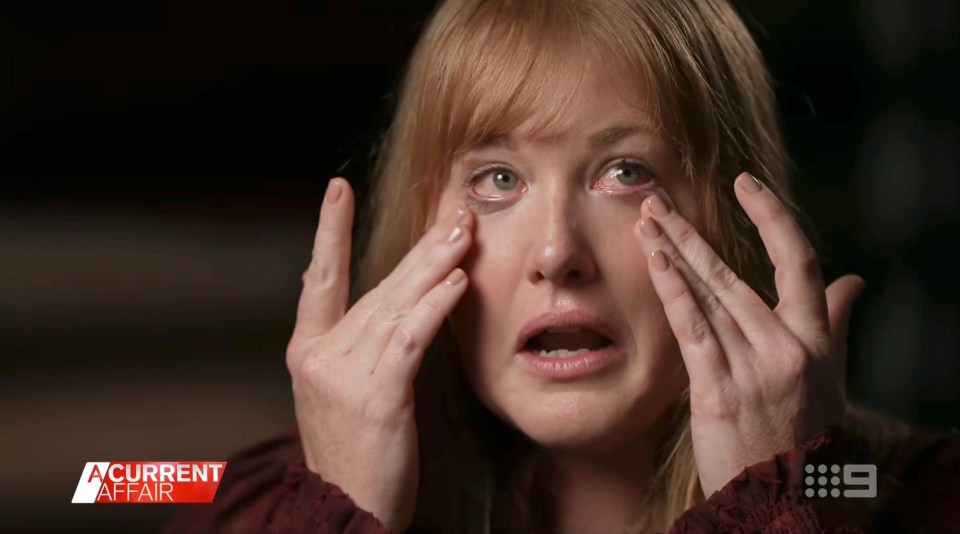 Katie Johnson, from Married at First Sight, wiping away tears during a 9NEWS interview.