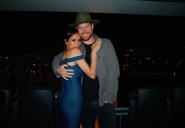 Meghan Markle and Prince Harry were spotted enjoying the fifth night of Beyoncé¿s Cowboy Carter Tour in California on Friday in a sweet behind-the-scenes snap