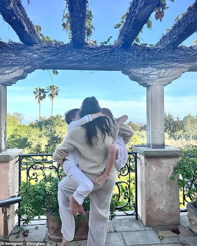Meghan Markle shared a new picture of Archie and Lilibet as she celebrated Mother's Day in the US - but it contains a telltale detail which detracts from the relatable image she likes to present