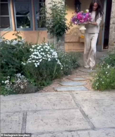 Meghan captioned the video 'Happy Sunday, friends' and has not allowed any comments on the post. She walked out barefoot holding the finished product
