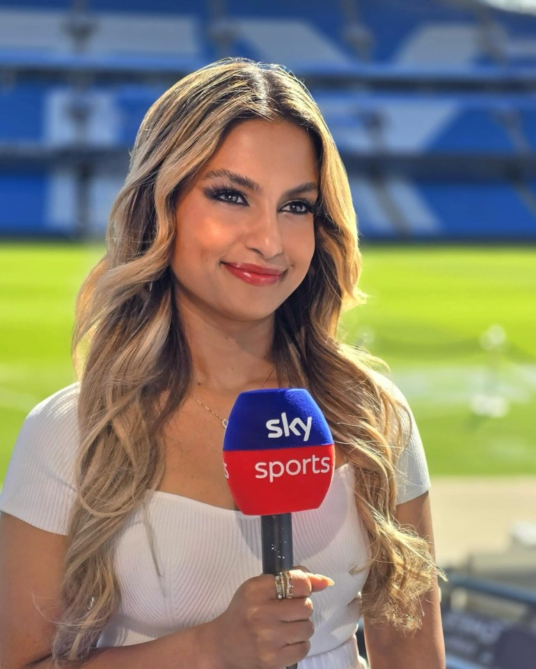 Melissa Reddy, Sky Sports presenter, holding a microphone.