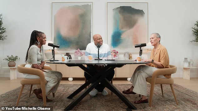 Michelle Obama (left) and her brother Craig Robinson (center) were discussing women's health issues with OBGYN Dr. Sharon Malone (right) when the former first lady questioned if there is a 'connection between aging sperm and birth defects', and alleged that Republicans would 'cut out research on that'