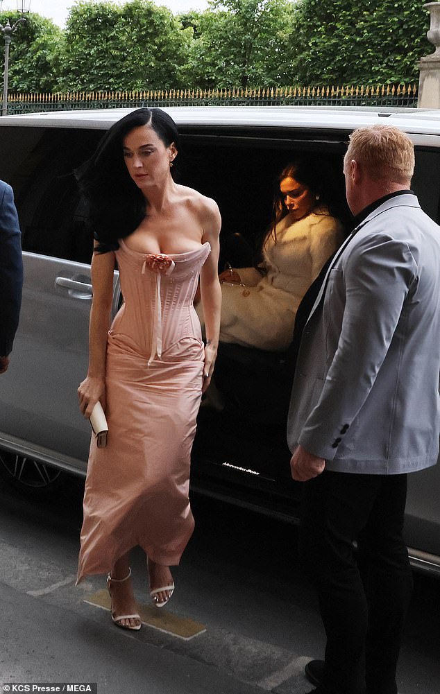 Katy — who recently enjoyed a controversial trip into space with Lauren Sanchez — is pictured getting out of the car at Jeff Bezos' partner's birthday, with Lauren behind her