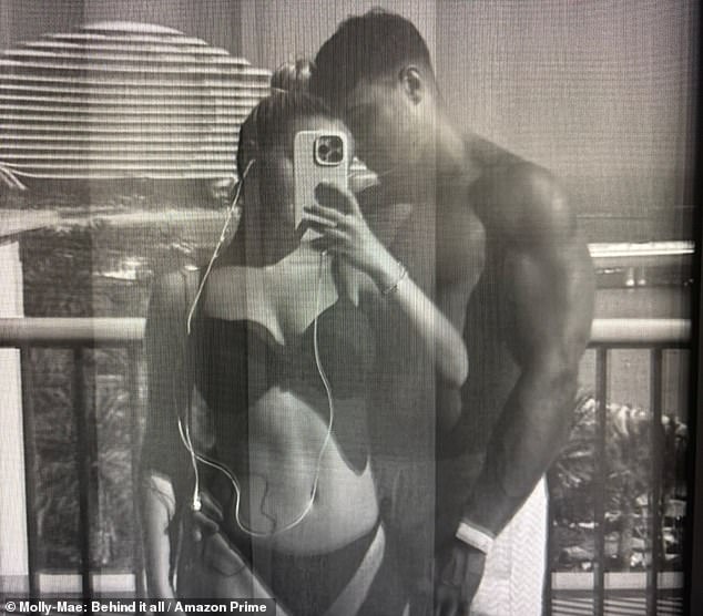 Molly Mae Hague shared this FIRST photo of herself with Tommy Fury since they reunited as sexy swimwear snap of the couple is shown was in the second part of her documentary