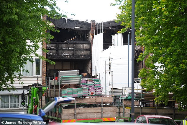 Scaffolding is erected on the front of the properties at the scene in Tillett Close, Stonebridge, in Brent following a fatal fire -- May 25, 2025